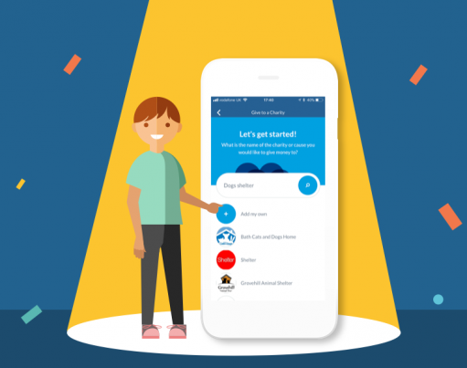 Illustration of a boy under a spotlight pointing at a device with the RoosterMoney app's give to a charity screen on it, on a dark blue stage with confetti overlaid